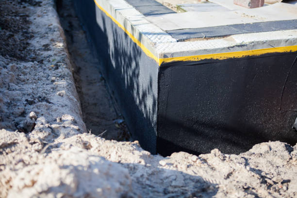 Professional Basement Waterproofing technician working in Pennsburg, PA